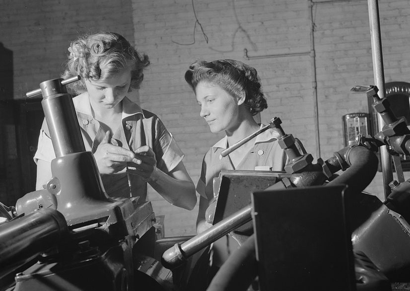 Two young workers are among the first women ever to operate a centerless grinder at Republic Drill and Tool Company, Chicago, Illinois.